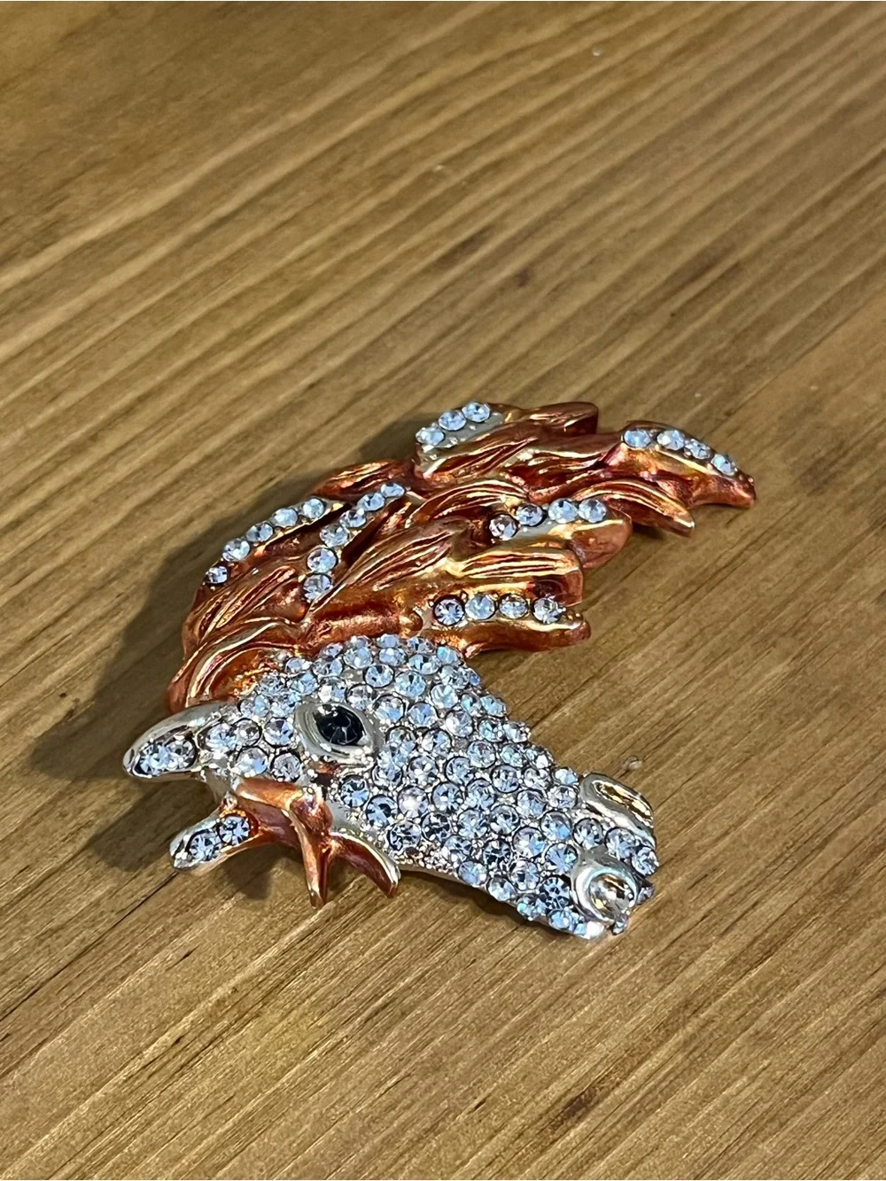 None this brooch